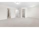 Main bedroom with carpet, two closets and ensuite bathroom at 1701 Mallard Trace Dr, Wendell, NC 27591