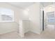 Upstairs hallway with carpet and linen closet at 1701 Mallard Trace Dr, Wendell, NC 27591
