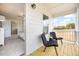 Relaxing balcony, accessible from the main bedroom, with a seating area overlooking the yard at 201 Broomgrove Way, Wake Forest, NC 27587