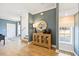 Inviting foyer with hardwood floors, modern accents, and abundant natural light at 201 Broomgrove Way, Wake Forest, NC 27587