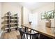 Spacious home office with a large desk, stylish shelving, and ample room for productivity at 201 Broomgrove Way, Wake Forest, NC 27587