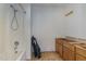 Bathroom with shower/tub combo and wood cabinets at 210 Alfalfa Ct, Smithfield, NC 27577