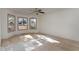 Spacious bedroom with large windows and wood flooring at 210 Alfalfa Ct, Smithfield, NC 27577