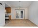 Dining area with access to the back deck and kitchen at 210 Alfalfa Ct, Smithfield, NC 27577