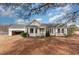 Ranch-style home with attached garage and spacious yard at 210 Alfalfa Ct, Smithfield, NC 27577