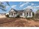 Front view of a single-story house with a yard at 210 Alfalfa Ct, Smithfield, NC 27577