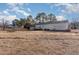 House exterior with large backyard and deck at 210 Alfalfa Ct, Smithfield, NC 27577
