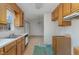 Galley kitchen with wood cabinets and appliances at 210 Alfalfa Ct, Smithfield, NC 27577