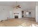 Open living space with vaulted ceiling and kitchen view at 210 Alfalfa Ct, Smithfield, NC 27577