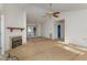 Living room featuring a fireplace and access to the deck at 210 Alfalfa Ct, Smithfield, NC 27577