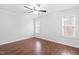 Bright bedroom with wood flooring and ceiling fan at 210 Charlotte Ct, Clayton, NC 27520