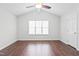 Large bedroom with vaulted ceiling, wood floors, and a window at 210 Charlotte Ct, Clayton, NC 27520