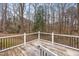Wooden deck overlooks a private wooded backyard at 210 Charlotte Ct, Clayton, NC 27520