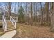 Wooden stairs leading from the deck to the backyard at 210 Charlotte Ct, Clayton, NC 27520