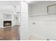 Bright laundry room with built-in shelving and gas dryer hookup at 210 Charlotte Ct, Clayton, NC 27520