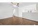 Open living room with hardwood floors and views of kitchen at 210 Charlotte Ct, Clayton, NC 27520