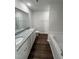 Modern bathroom with double vanity, granite countertop, and bathtub at 241 Magnolia Run Way, Benson, NC 27504