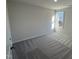 Bright bedroom with carpeted floor at 241 Magnolia Run Way, Benson, NC 27504