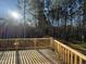 Wooden deck overlooking a wooded area at 241 Magnolia Run Way, Benson, NC 27504