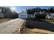 Two-car garage and driveway at 241 Magnolia Run Way, Benson, NC 27504