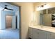 Bathroom with vanity, sink, and shower. Bedroom access at 2426 Gathering Square Ct # 2426, Fuquay Varina, NC 27526