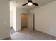 Spacious bedroom with carpeted floors and a large closet at 2426 Gathering Square Ct # 2426, Fuquay Varina, NC 27526