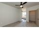 Bright bedroom with carpeted floors and a large closet at 2426 Gathering Square Ct # 2426, Fuquay Varina, NC 27526