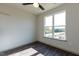 Bedroom with large window and wood flooring at 2426 Gathering Square Ct # 2426, Fuquay Varina, NC 27526