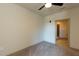 Bedroom with carpet, ceiling fan, and en-suite bathroom access at 2426 Gathering Square Ct # 2426, Fuquay Varina, NC 27526