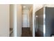Hallway with wood flooring and access to bedrooms at 2426 Gathering Square Ct # 2426, Fuquay Varina, NC 27526
