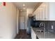 Modern kitchen with stainless steel appliances and granite countertop at 2426 Gathering Square Ct # 2426, Fuquay Varina, NC 27526