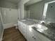 Bathroom with double vanity and granite countertop at 309 Starry Sky Dr, Benson, NC 27504