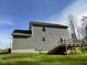 Gray siding two story house with wooden deck at 309 Starry Sky Dr, Benson, NC 27504
