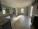 Modern kitchen with granite countertops and dark cabinets at 309 Starry Sky Dr, Benson, NC 27504