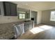 Eat-in kitchen featuring granite countertops and dark cabinets at 309 Starry Sky Dr, Benson, NC 27504