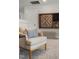 Bright bonus room with an armchair, patterned bench, and a decorative wall-mounted Scrabble game at 346 Duncan Creek Rd # 160, Lillington, NC 27546