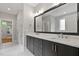 Stylish bathroom featuring a double vanity, quartz countertops, and modern fixtures at 3913 Cedar Knolls # 7, Youngsville, NC 27596