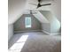 Large bedroom with vaulted ceilings, two ceiling fans and new carpet at 3913 Cedar Knolls # 7, Youngsville, NC 27596