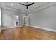 Spacious bedroom with hardwood floors, crown molding, and a neutral color palette at 3913 Cedar Knolls # 7, Youngsville, NC 27596