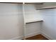 Spacious walk-in closet with custom shelving and hardwood floors, perfect for organization at 3913 Cedar Knolls # 7, Youngsville, NC 27596