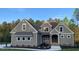 Charming home showcasing a blend of traditional and modern architecture, complete with meticulously maintained landscaping at 3913 Cedar Knolls # 7, Youngsville, NC 27596