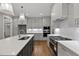 Modern kitchen with stainless steel appliances, white subway tile backsplash, and center island at 3913 Cedar Knolls # 7, Youngsville, NC 27596