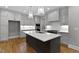 Gourmet kitchen features a large island, stainless appliances, and plenty of cabinet space at 3913 Cedar Knolls # 7, Youngsville, NC 27596