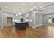 Open concept kitchen boasts stainless appliances, custom cabinets, and an eat-in central island at 3913 Cedar Knolls # 7, Youngsville, NC 27596