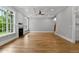 Cozy living room featuring a fireplace, coffered ceiling, and beautiful hardwood floors at 3913 Cedar Knolls # 7, Youngsville, NC 27596