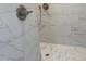 Beautiful shower with marble tiling, rain shower head, and stylish fixtures at 3913 Cedar Knolls # 7, Youngsville, NC 27596