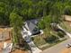 Aerial view of a stunning house with a long driveway surrounded by trees at 3923 Cedar Knolls Dr # 12, Youngsville, NC 27596