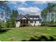 Lush backyard with a screened porch, perfect for relaxing and entertaining at 3923 Cedar Knolls Dr # 12, Youngsville, NC 27596
