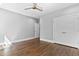Spacious bedroom features hardwood floors, ceiling fan and access to ensuite at 3923 Cedar Knolls Dr # 12, Youngsville, NC 27596