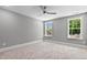 Bedroom featuring neutral walls, carpeted floors and a ceiling fan at 3923 Cedar Knolls Dr # 12, Youngsville, NC 27596